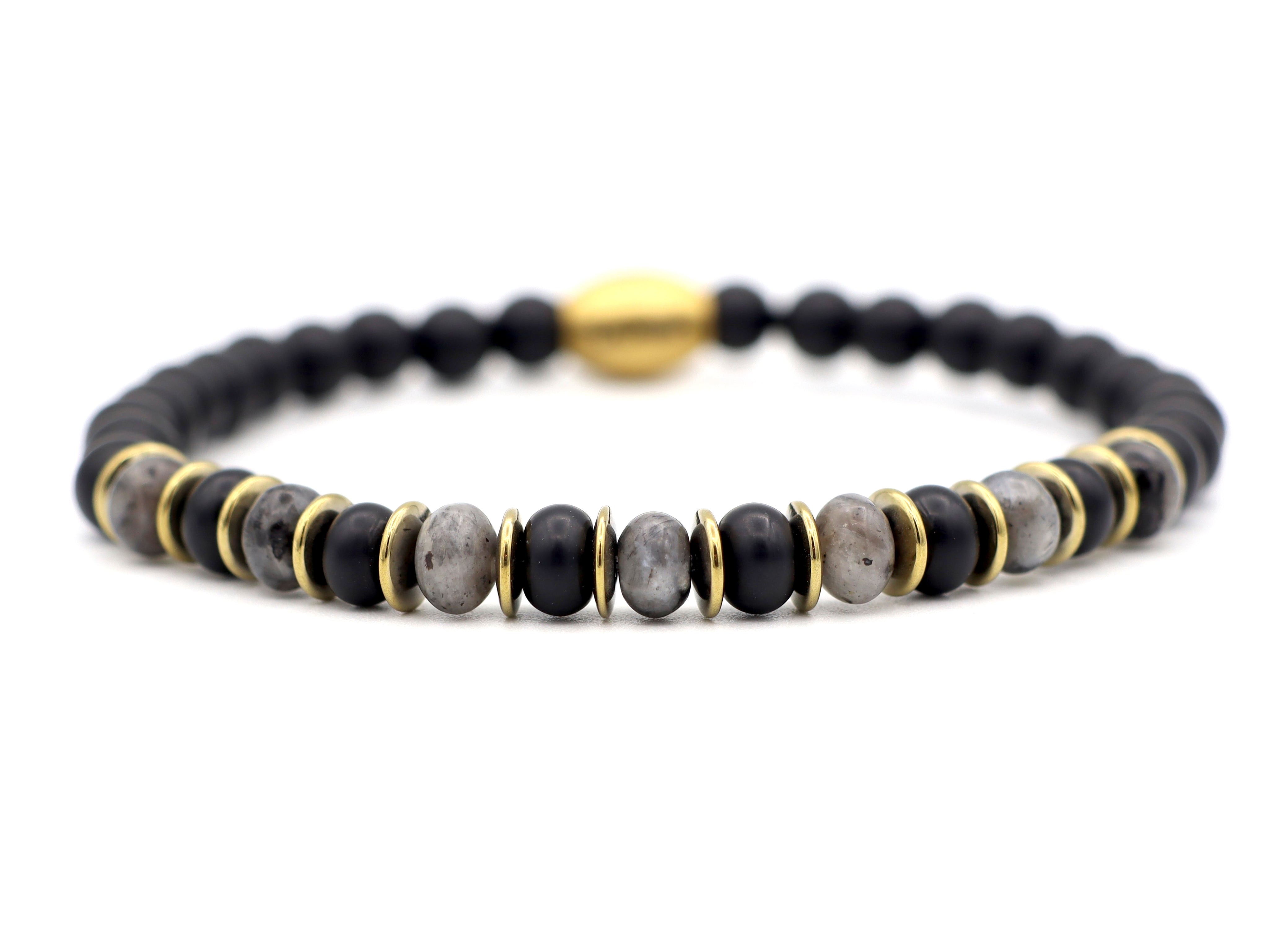 Enam Jimat larvikiet (zilver of goud)