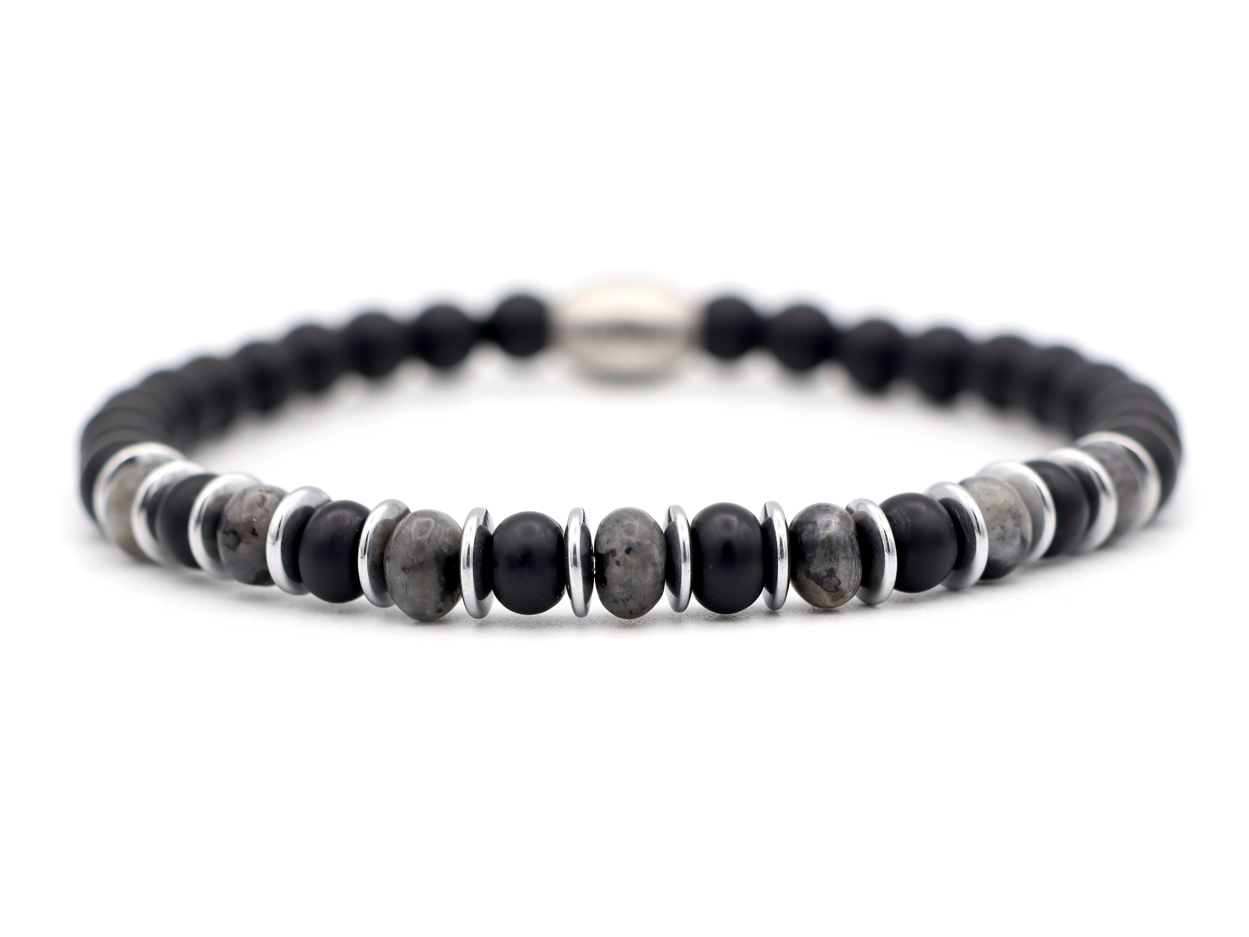 Enam Jimat larvikiet (zilver of goud)